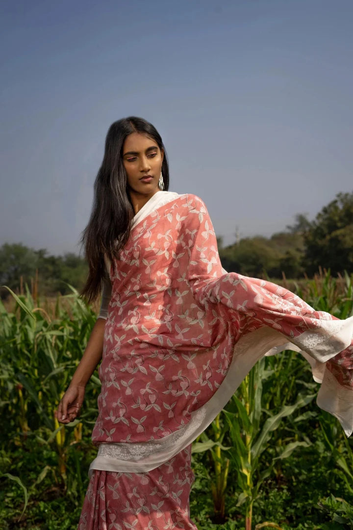 Ilamra kalamkari craft hand block printed organic cotton Gulab pink with black and red detailing on a pebble white canvas saree