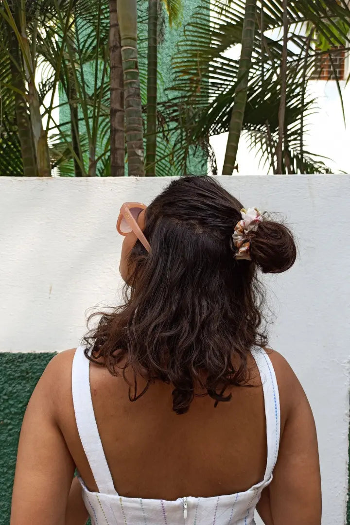 ilamra hand block printed naturally dyed organic cotton Off-white, hints of orange, blush pink, light green and dirty green upcycled cotton beautiful scrunchie