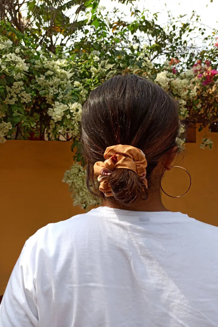 ilamra hand block printed naturally dyed organic cotton Orange and hints of madder red upcycled cotton sexy scrunchie