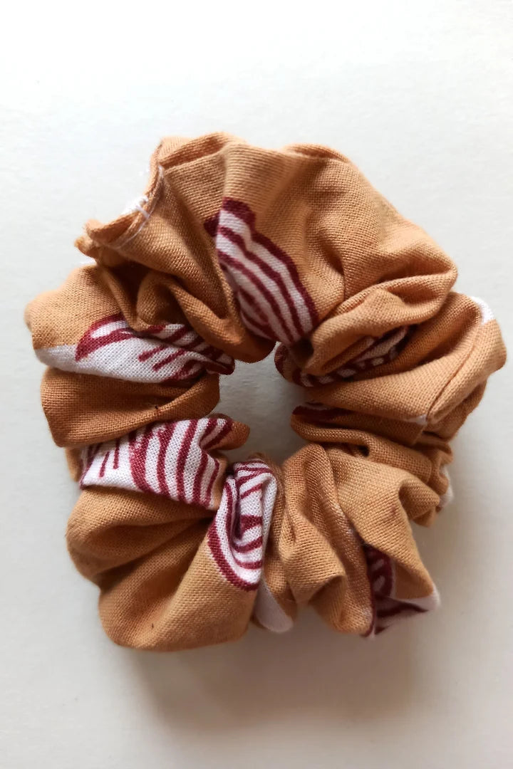 ilamra hand block printed naturally dyed organic cotton Orange and hints of madder red upcycled cotton sexy scrunchie