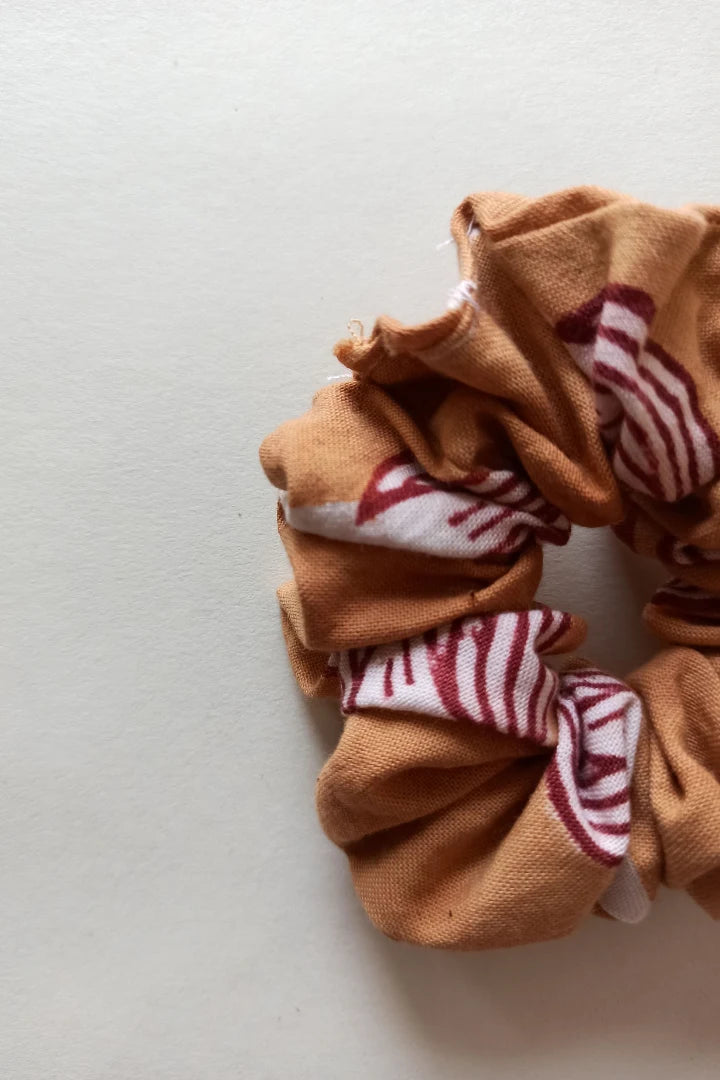 ilamra hand block printed naturally dyed organic cotton Orange and hints of madder red upcycled cotton sexy scrunchie