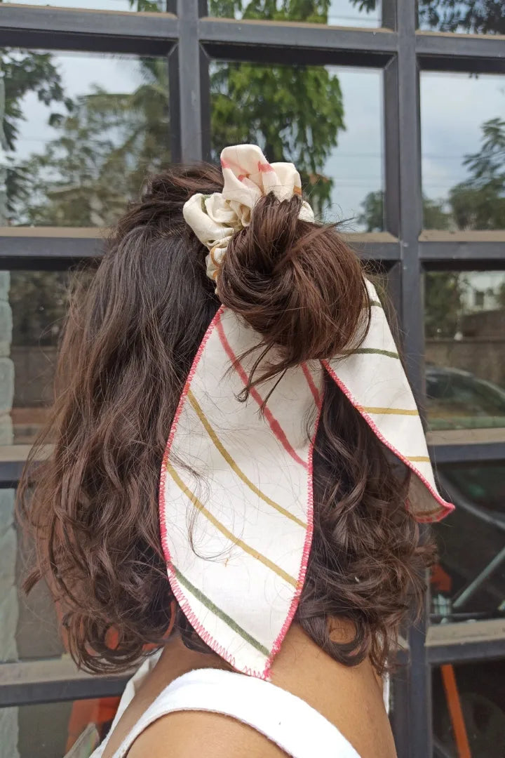 ilamra hand block printed naturally dyed organic cotton Off-white, hints of orange, blush pink, light green and dirty green upcycled cotton fun scrunchie