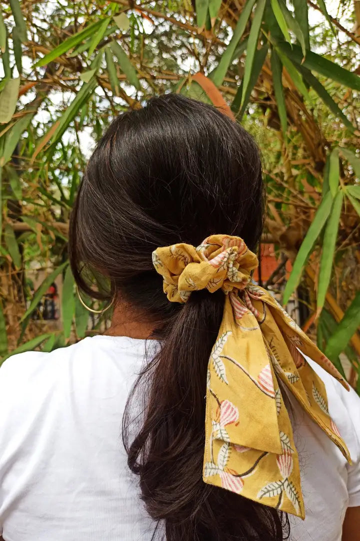 ilamra hand block printed naturally dyed organic cotton Mustard yellow, hints of dirty green and red upcycled cotton pastel shade scrunchie