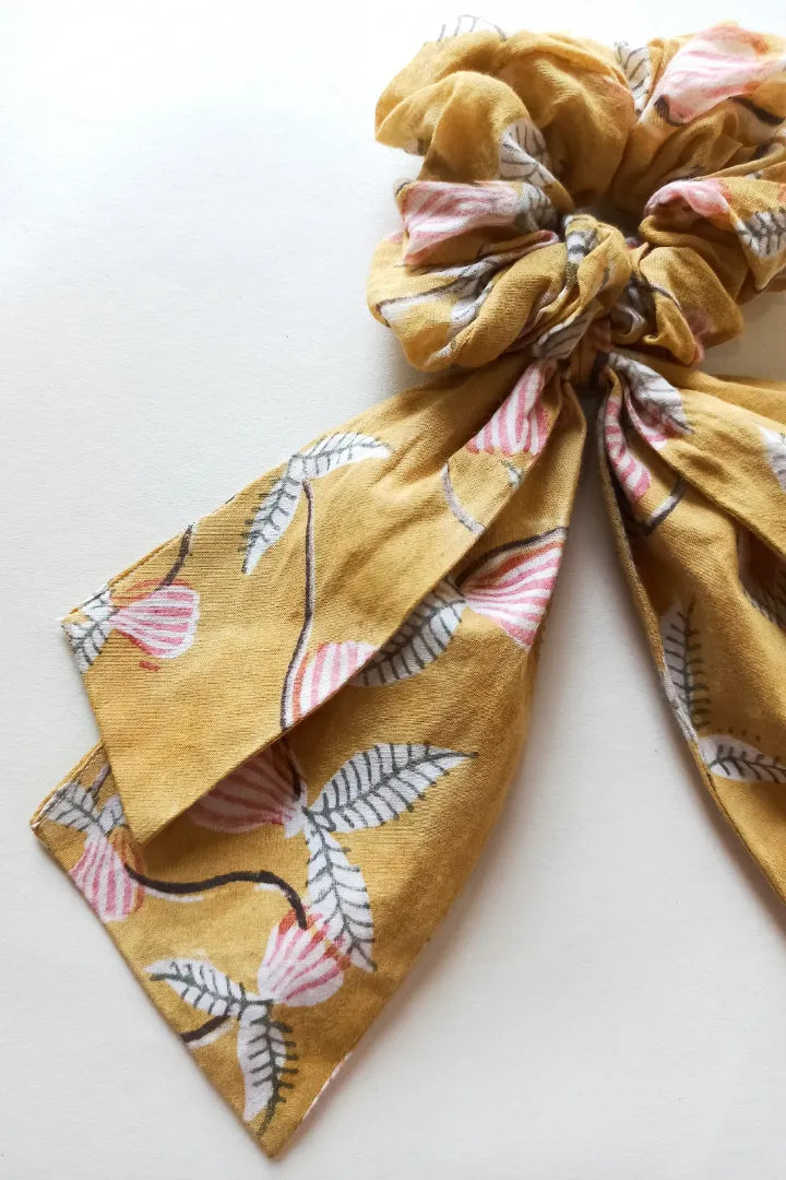 ilamra hand block printed naturally dyed organic cotton Mustard yellow, hints of dirty green and red upcycled cotton pastel shade scrunchie