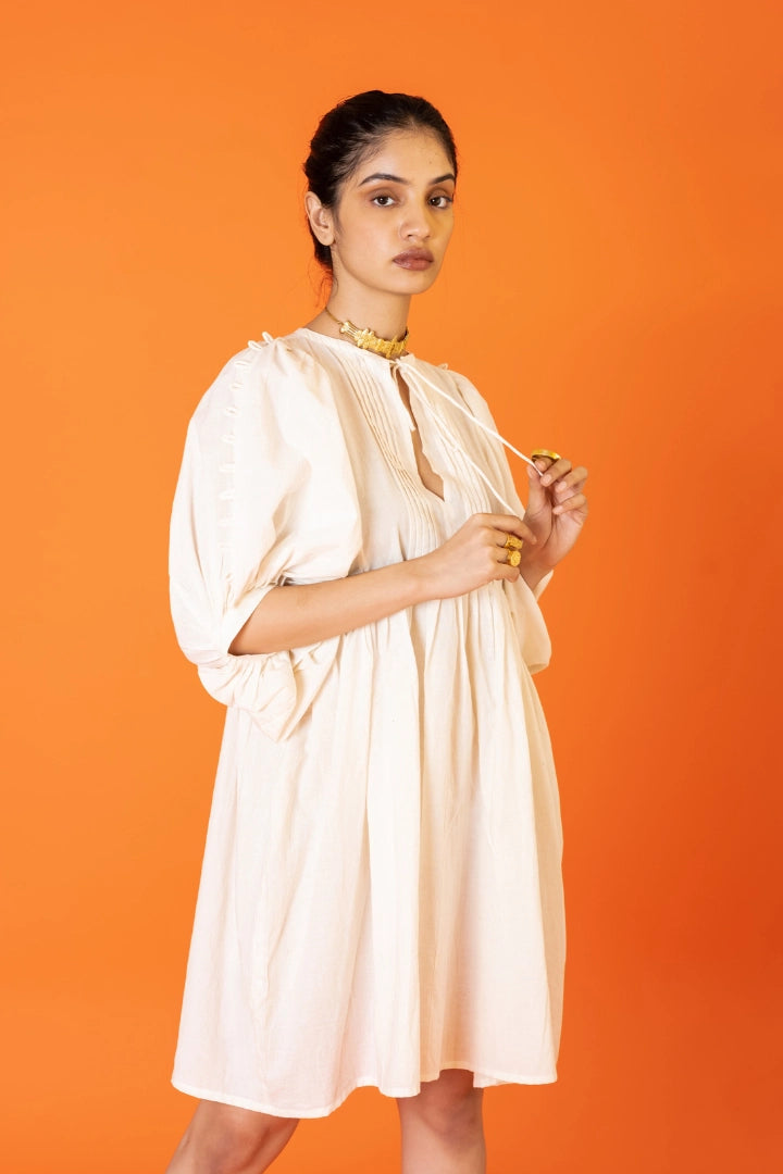 ilamra naturally dyed organic cotton pebble white free flowing beautiful dress