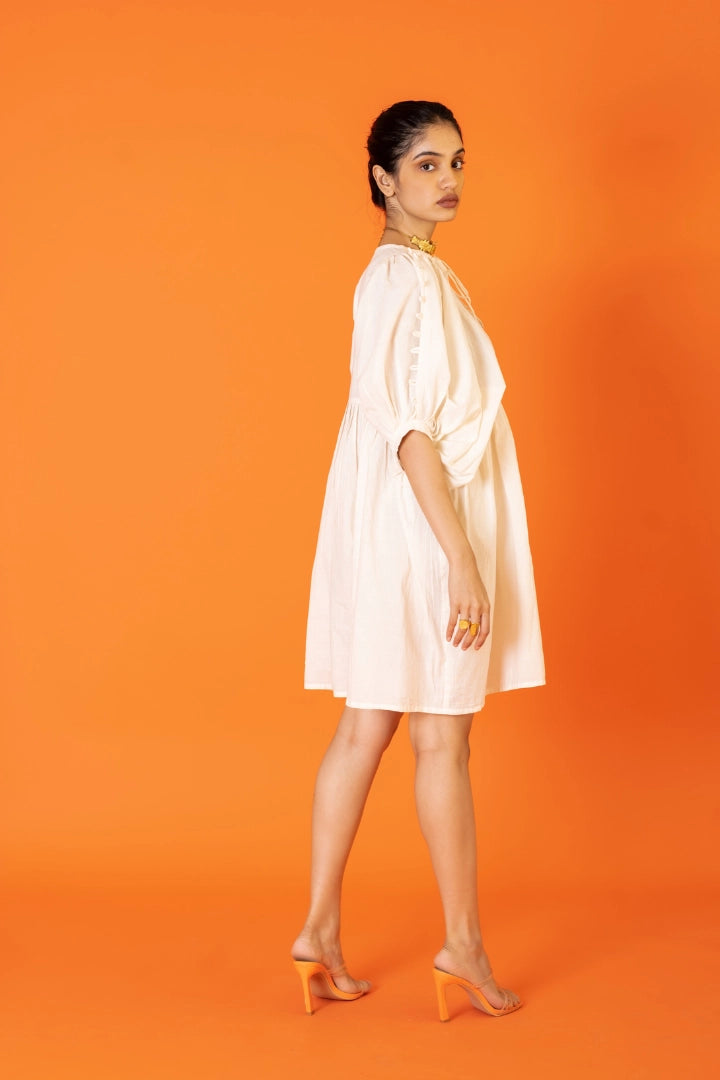 ilamra naturally dyed organic cotton pebble white free flowing beautiful dress