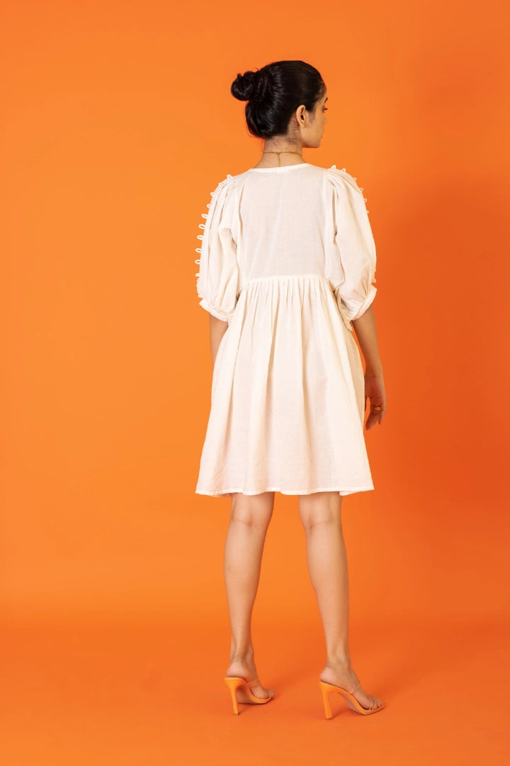 ilamra naturally dyed organic cotton pebble white free flowing beautiful dress