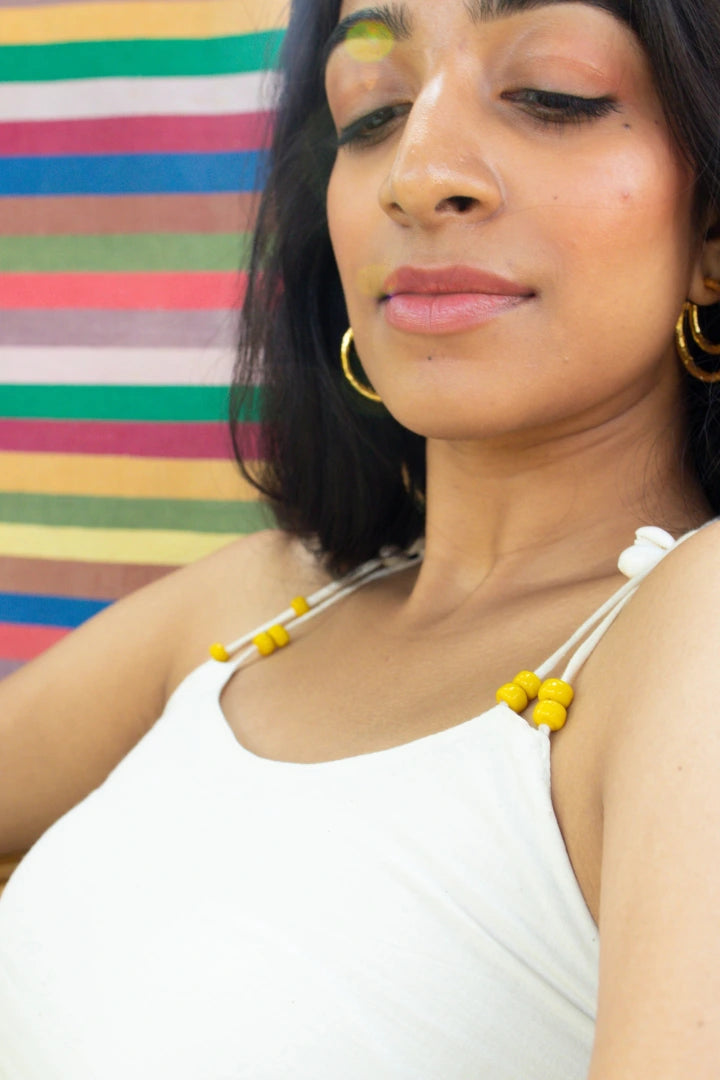 Ilamra hand block printed sustainably made naturally dyed off-white dress with yellow print