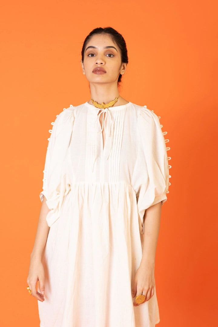 ilamra naturally dyed organic cotton pebble white free flowing beautiful dress