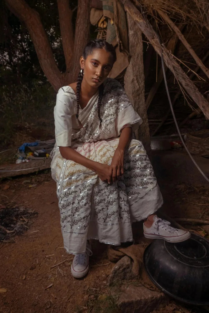 Ilamra kalamkari craft hand block printed organic cotton Pebble white base with orange, pink, lime green and dirty green motifs saree