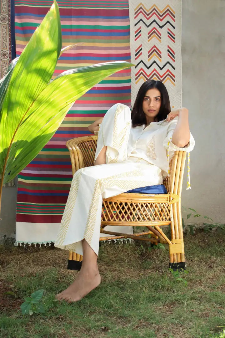 ilamra hand block printed naturally dyed organic cotton white pants with yellow print