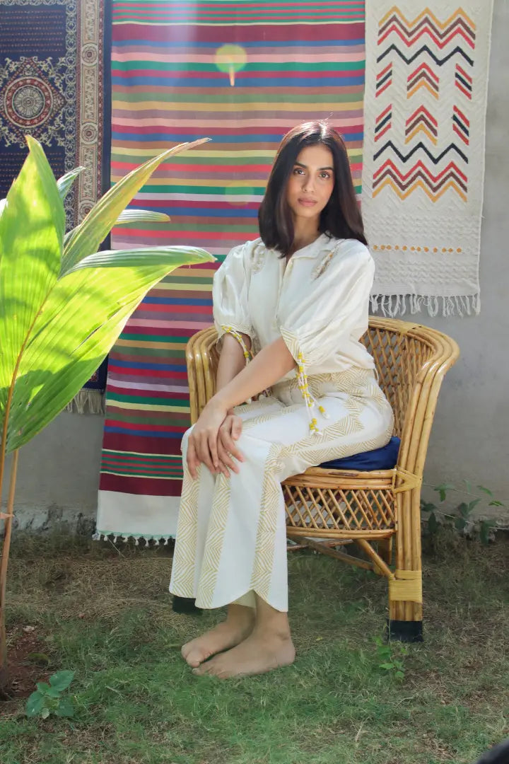 ilamra hand block printed naturally dyed organic cotton white pants with yellow print