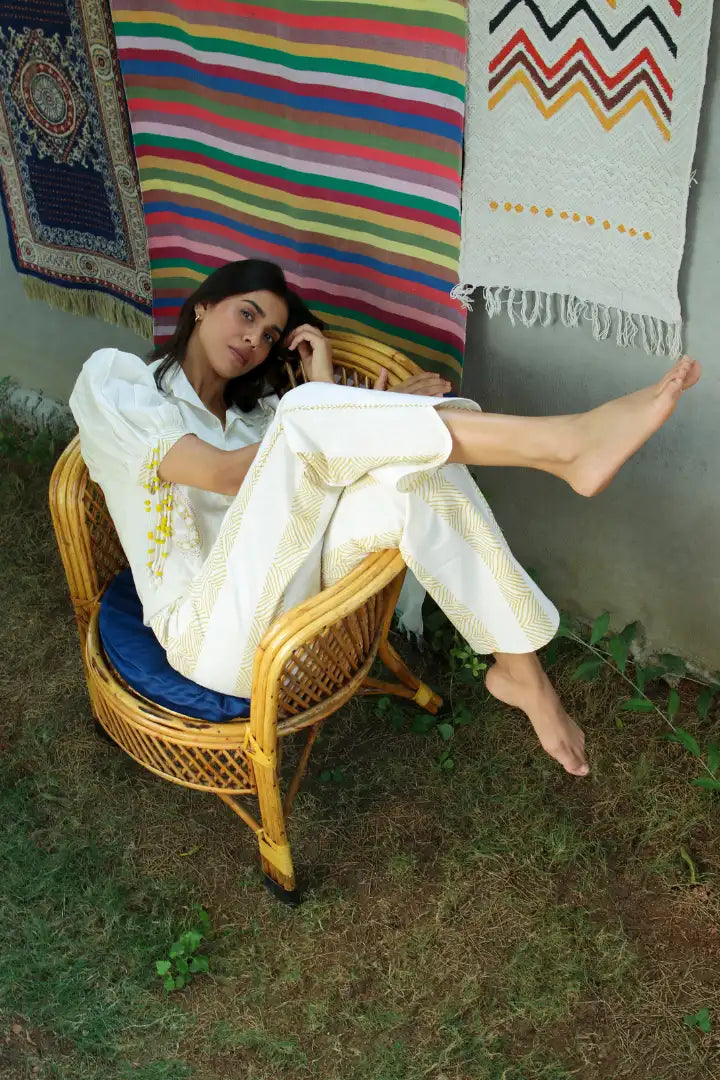 ilamra hand block printed naturally dyed organic cotton white pants with yellow print