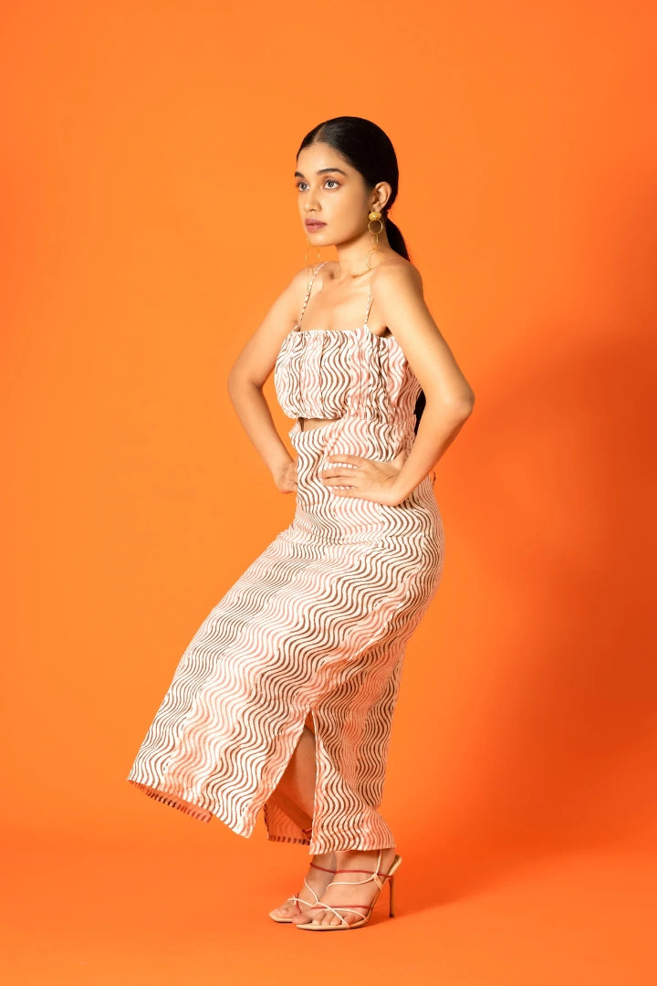 Ilamra hand block printed sustainably made naturally dyed wavy print pink and brown cut-out dress