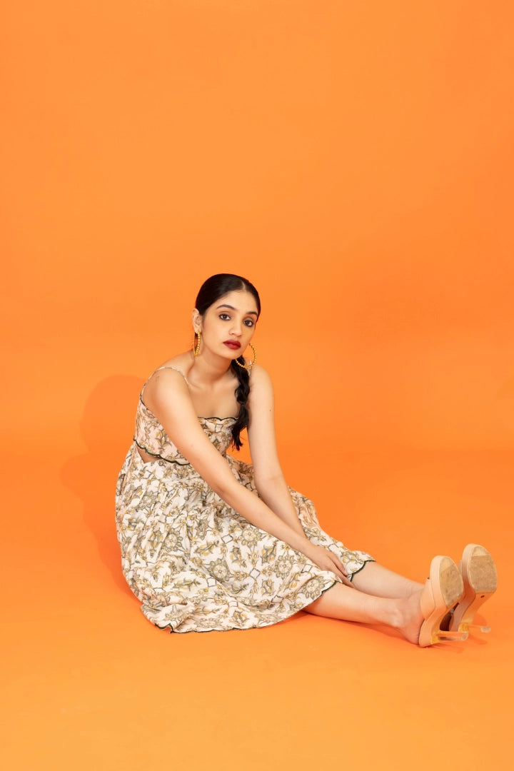 Ilamra hand block printed sustainably made naturally dyed yellow and dirty green on off-white chic cut-out dress