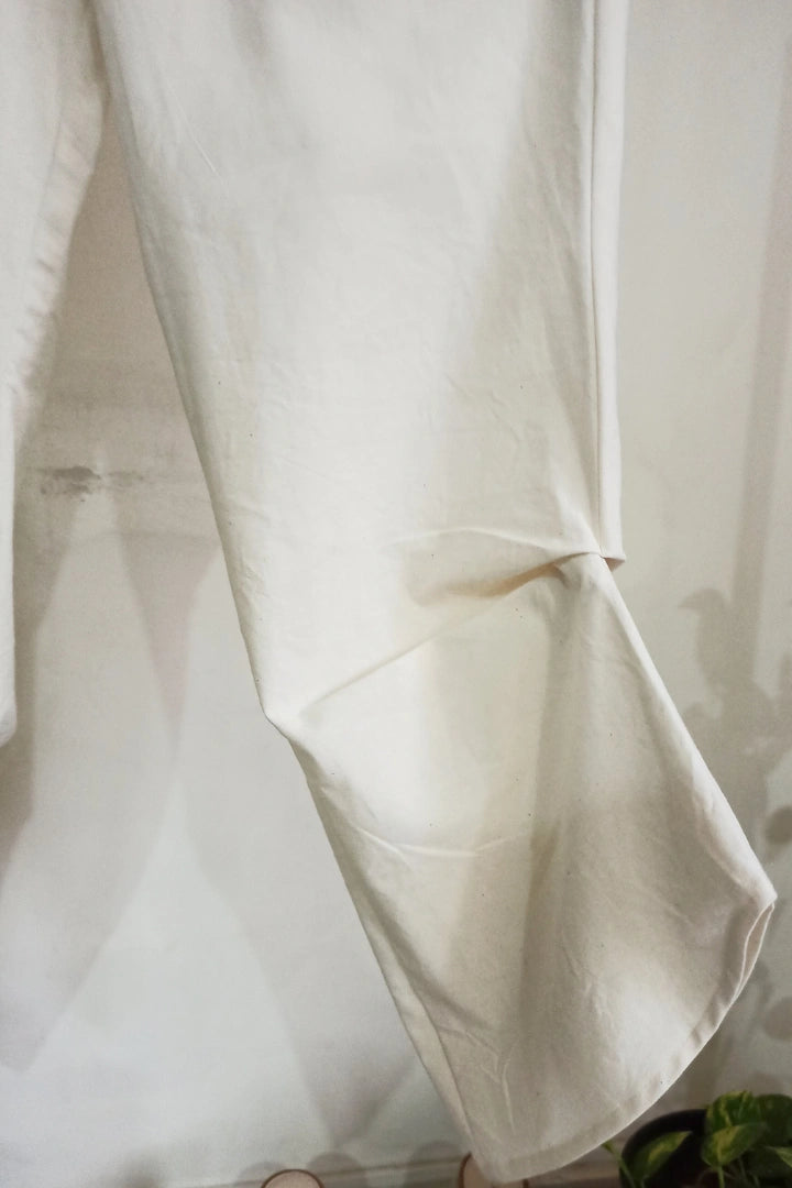 Ilamra kalamkari craft hand block printed organic cotton Off-white curved asymmetrical hem and are ruched at the bottom pants