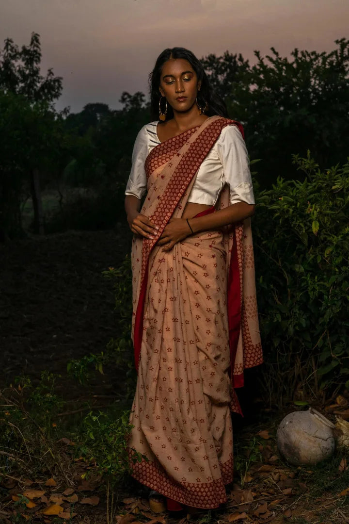 Ilamra kalamkari craft hand block printed organic cotton Indian madder red on a beige base saree