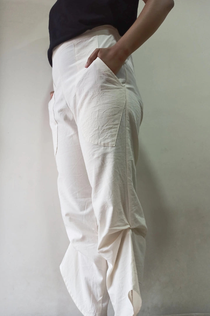 Ilamra kalamkari craft hand block printed organic cotton Off-white curved asymmetrical hem and are ruched at the bottom pants