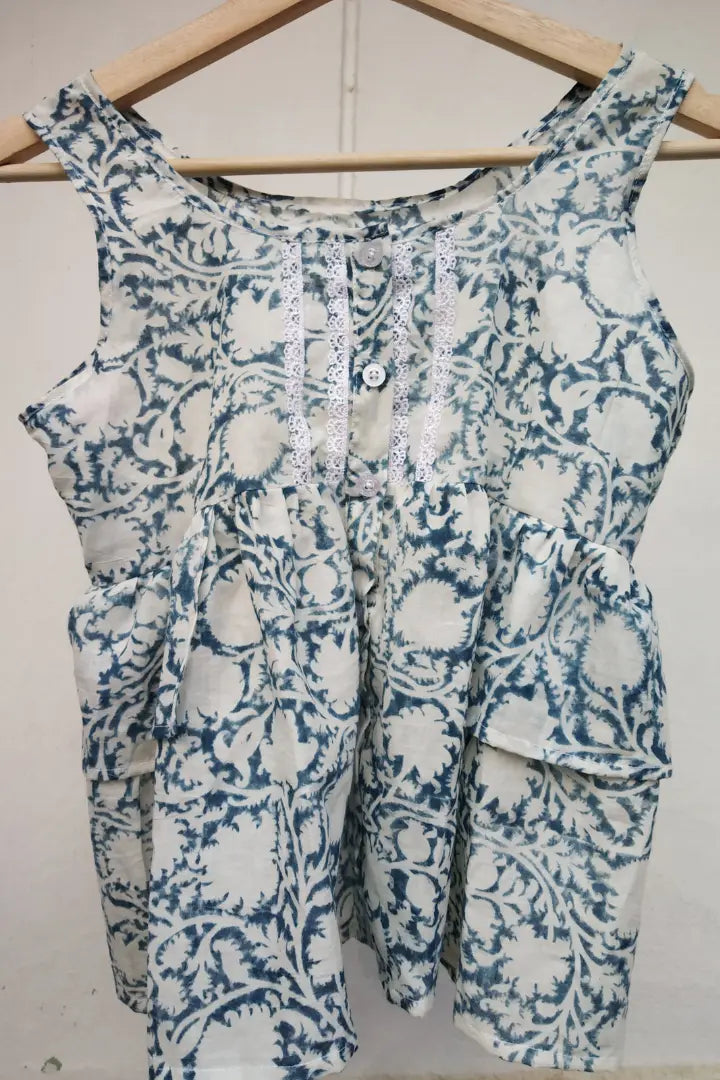 Ilamra sustainable clothing organic cotton Indigo, off-white, hints of fresh green and madder red hand block printed frilly top