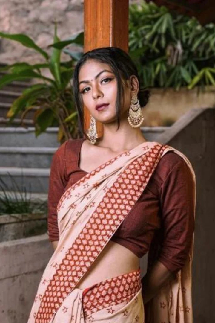 Ilamra kalamkari craft hand block printed organic cotton Indian madder red on a beige base saree