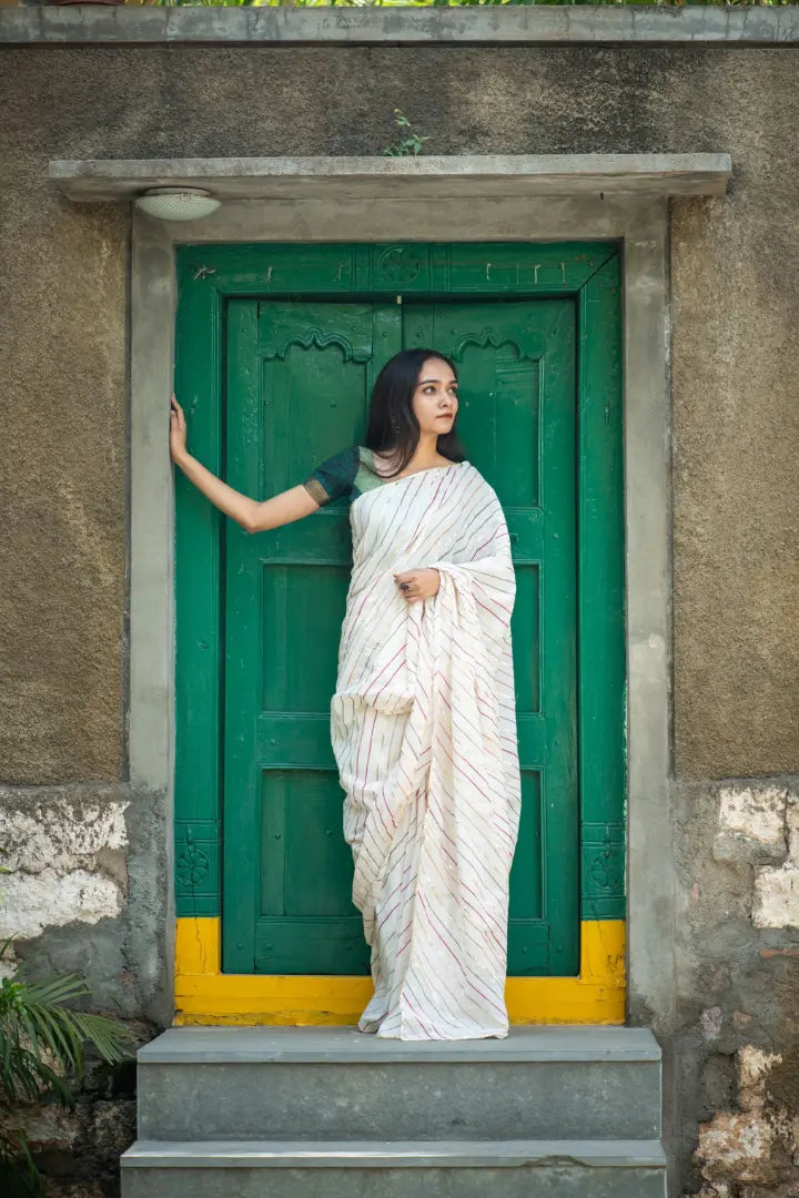Ilamra sustainable clothing organic cotton Off-White, dirty Green, blush pink, orange and hints of gold hand block printed saree