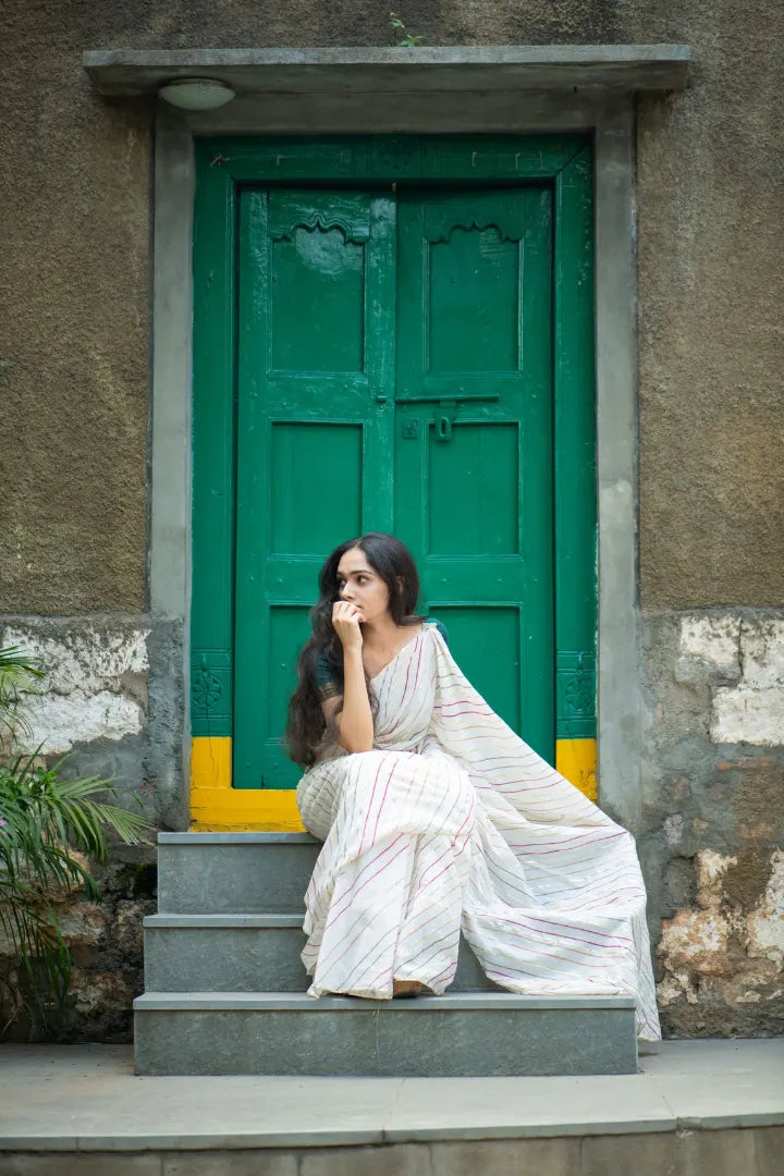 Ilamra sustainable clothing organic cotton Off-White, dirty Green, blush pink, orange and hints of gold hand block printed saree