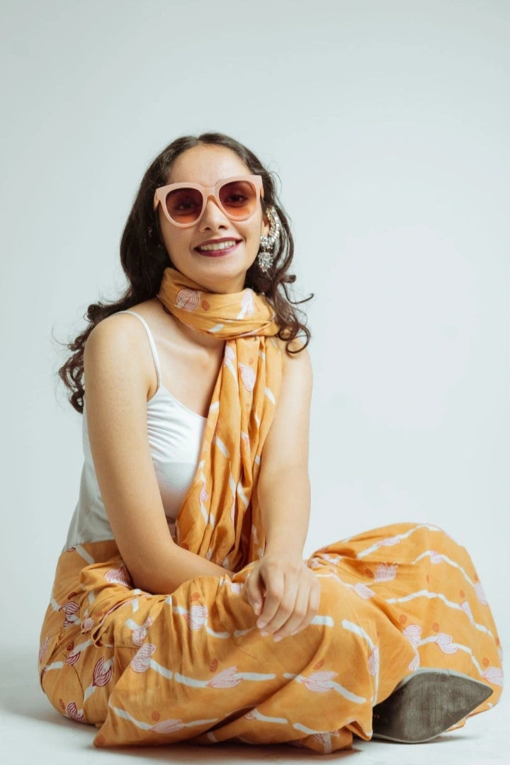 Ilamra hand block printed sustainably made naturally dyed Orange, Madder Red, and Off-White saree pants