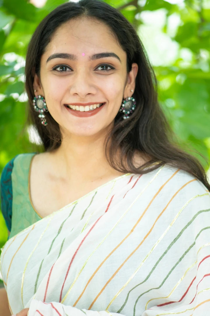 Ilamra sustainable clothing organic cotton Off-White, dirty Green, blush pink, orange and hints of gold hand block printed saree