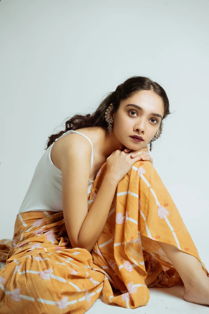 Ilamra hand block printed sustainably made naturally dyed Orange, Madder Red, and Off-White saree pants