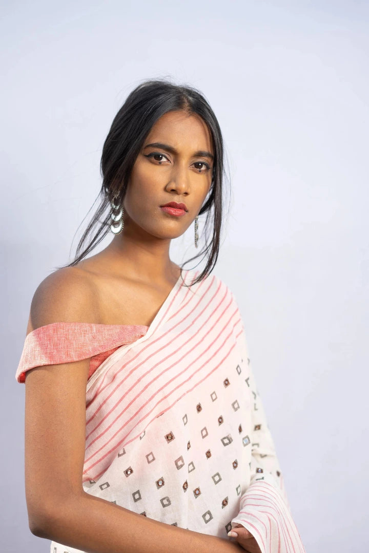 Ilamra kalamkari craft hand block printed organic cotton Pebble white saree with Madder red, black and mustard yellow detailing saree