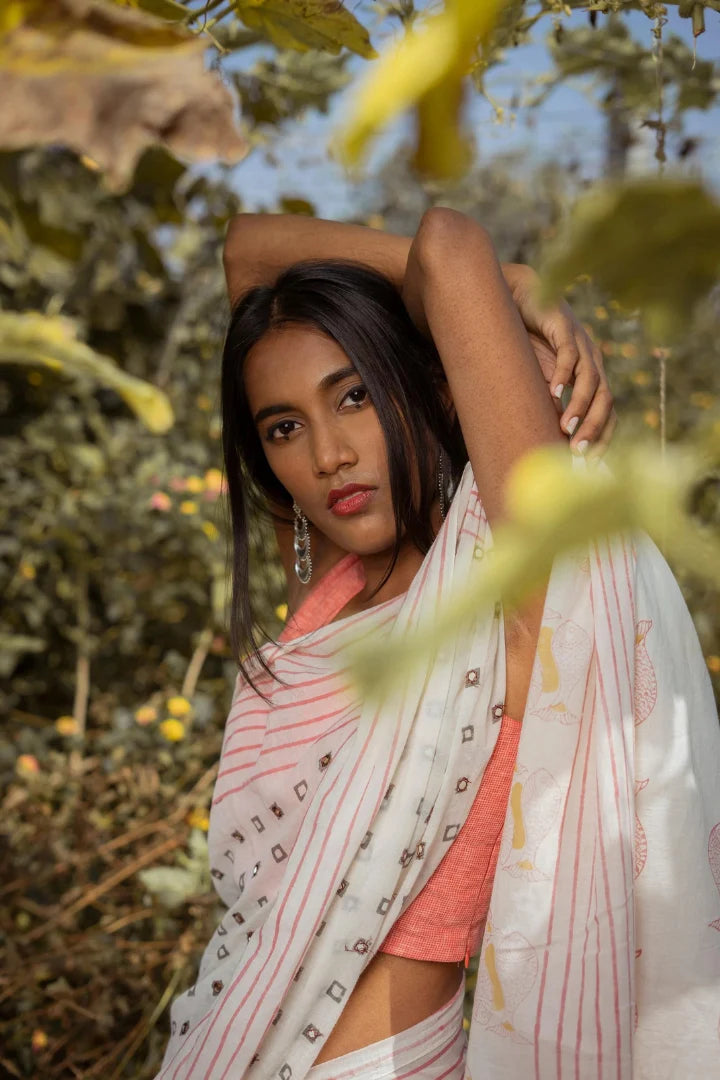 Ilamra kalamkari craft hand block printed organic cotton Pebble white saree with Madder red, black and mustard yellow detailing saree