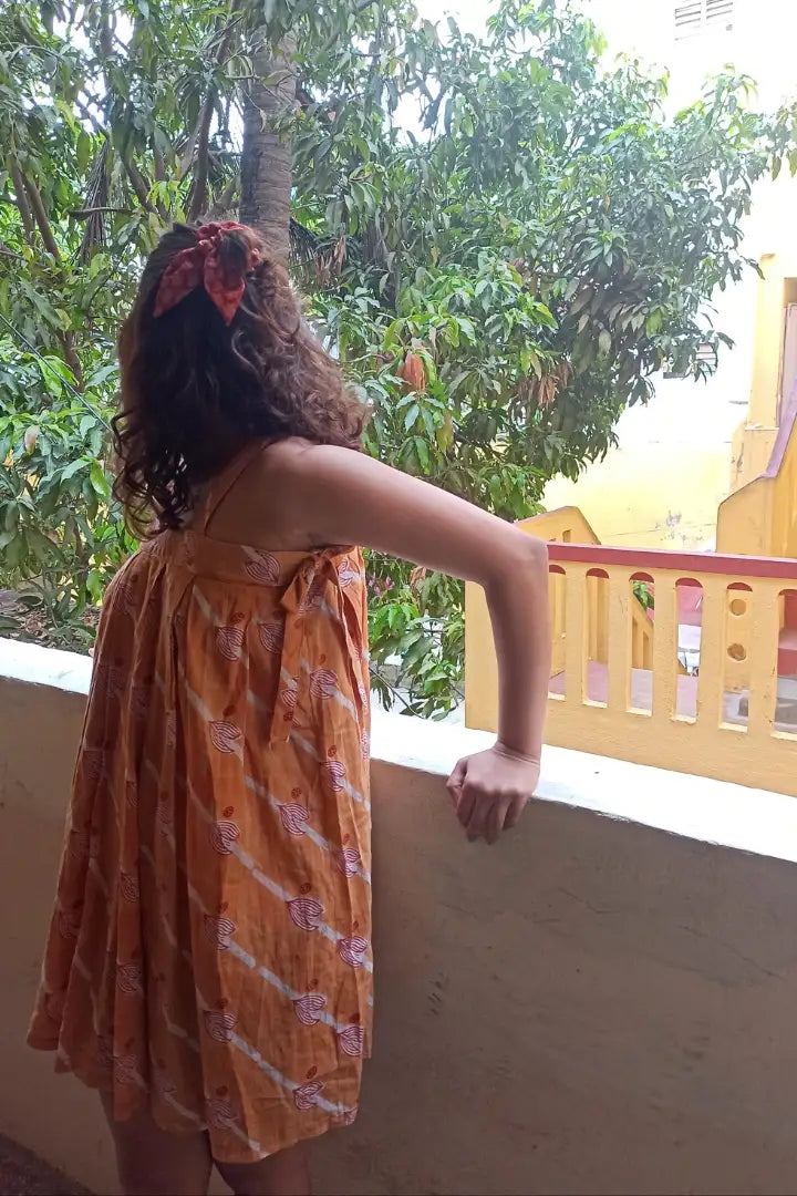 ilamra hand block printed naturally dyed organic cotton Orange, Madder Red, and Off-White quirky and fun dress