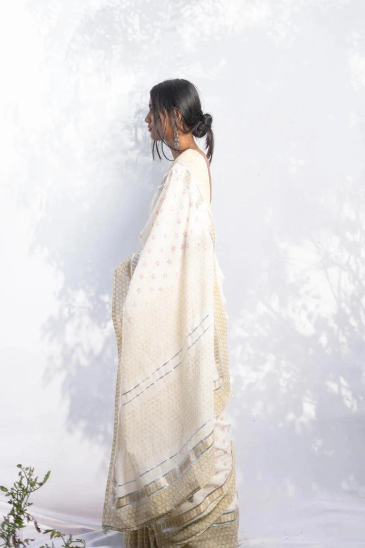 Ilamra kalamkari craft hand block printed organic cotton Pebble white base with an olive green border and silver detailing saree