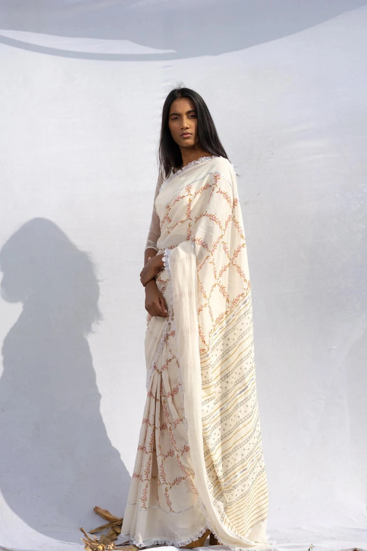 Ilamra kalamkari craft hand block printed organic cotton Pink and green peppercorn motifs on a pebble white base saree