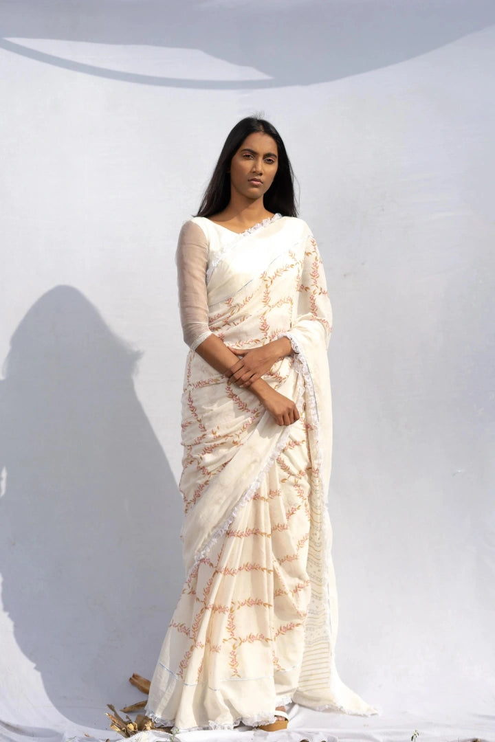 Ilamra kalamkari craft hand block printed organic cotton Pink and green peppercorn motifs on a pebble white base saree