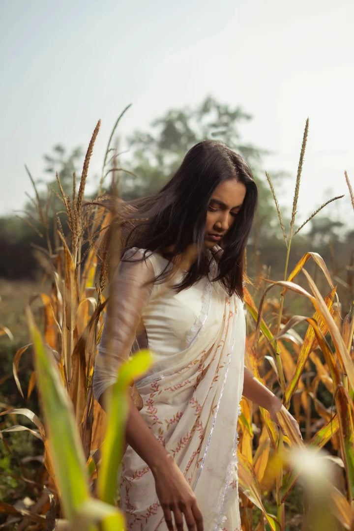 Ilamra kalamkari craft hand block printed organic cotton Pink and green peppercorn motifs on a pebble white base saree