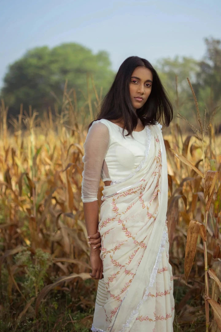 Ilamra kalamkari craft hand block printed organic cotton Pink and green peppercorn motifs on a pebble white base saree