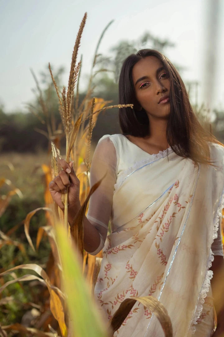 Ilamra kalamkari craft hand block printed organic cotton Pink and green peppercorn motifs on a pebble white base saree