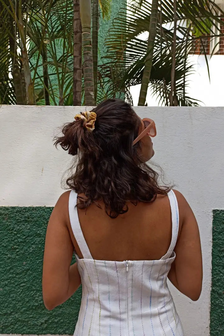 ilamra hand block printed naturally dyed organic cotton Mustard yellow, hints of dirty green and red upcycled cotton scrunchie