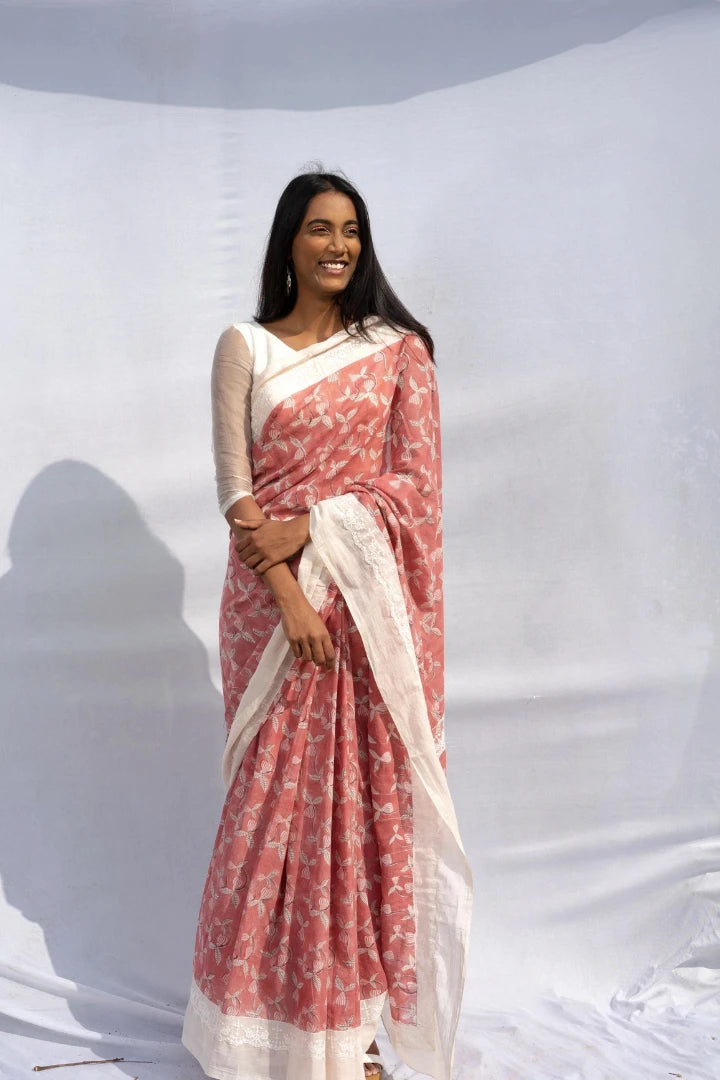 Ilamra kalamkari craft hand block printed organic cotton Gulab pink with black and red detailing on a pebble white canvas saree