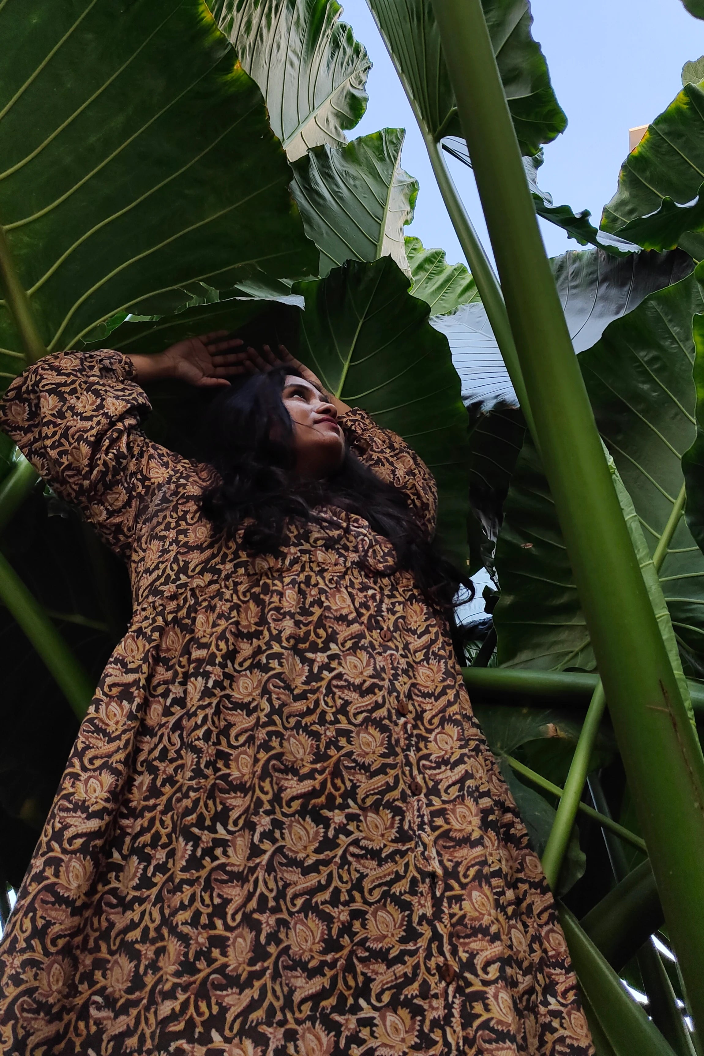 Ilamra hand block printed Kalamkari art organic cotton naturally dyed black, hazel, and beige, ruffle detailing, balloon sleeves ending in cuffs, calf-length dress