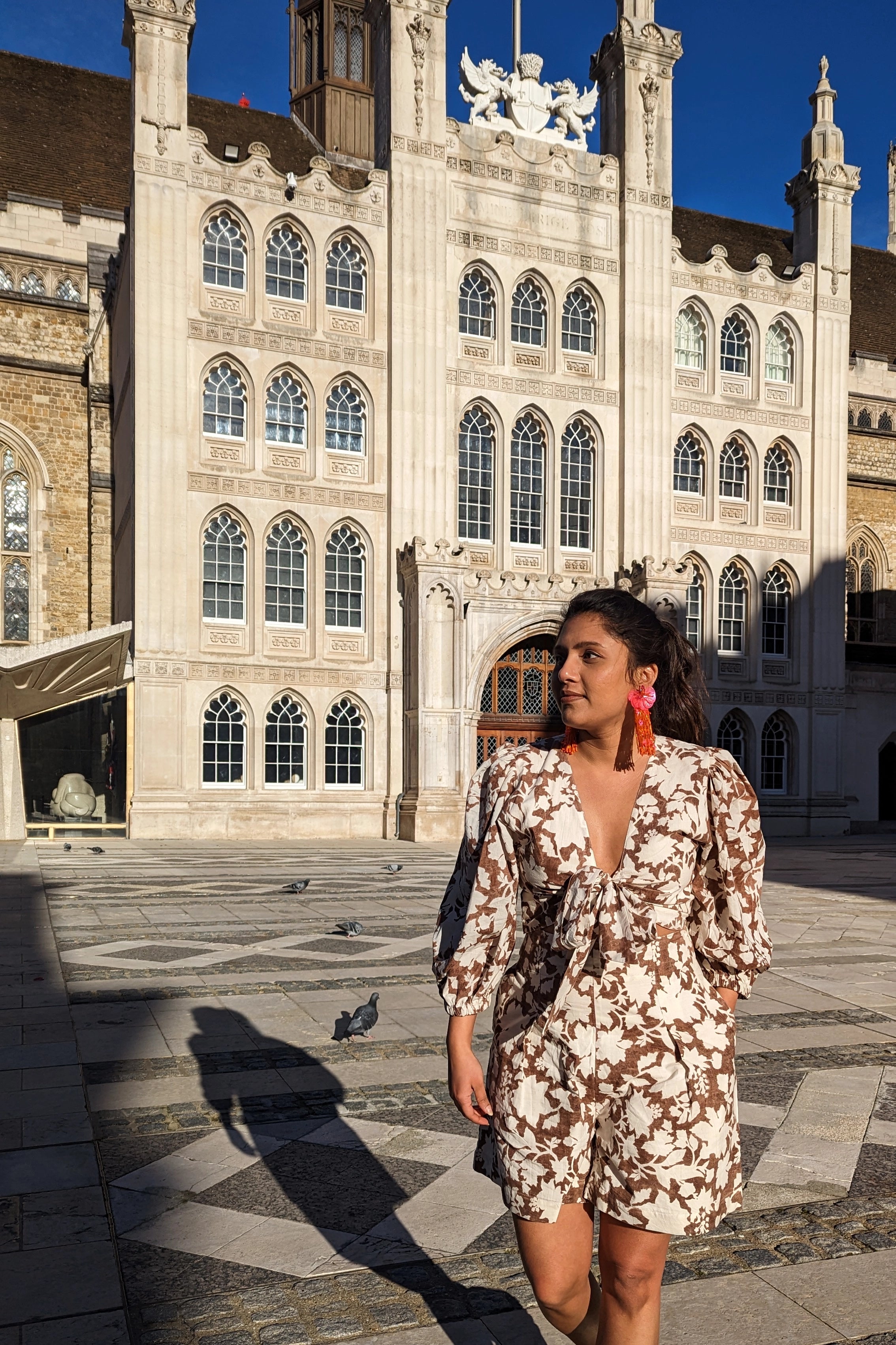 Ilamra hand block printed Kalamkari art organic cotton naturally dyed in deep cocoa brown on a pale white background, plunging neckline, wrist length sleeves, classy, cool, tie up puff top