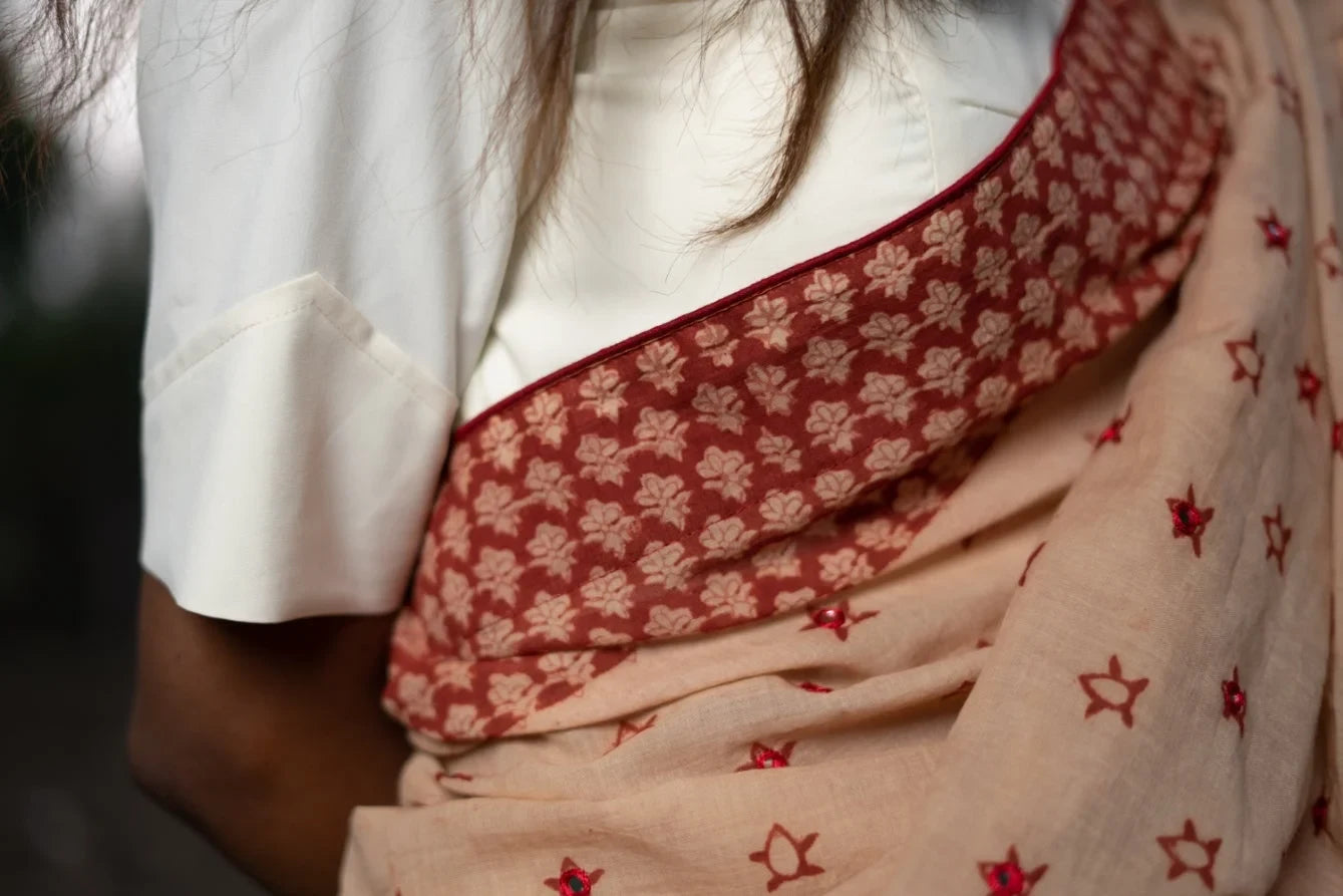 Ilamra kalamkari craft hand block printed organic cotton Indian madder red on a beige base saree