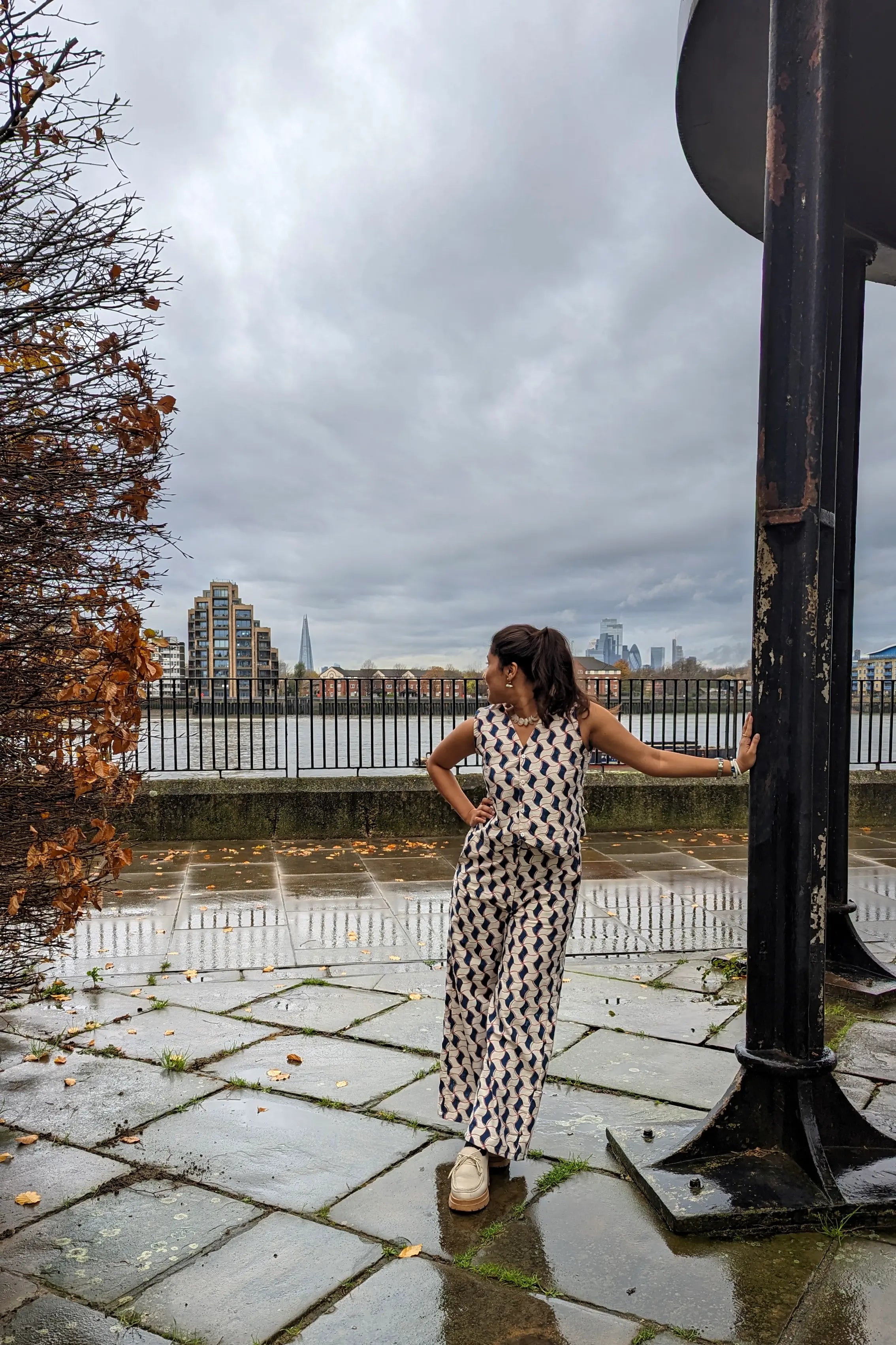 Ilamra hand block printed Kalamkari art organic cotton naturally dyed sharp v-neck and button-down fastening, fitted vest and relaxed pants.