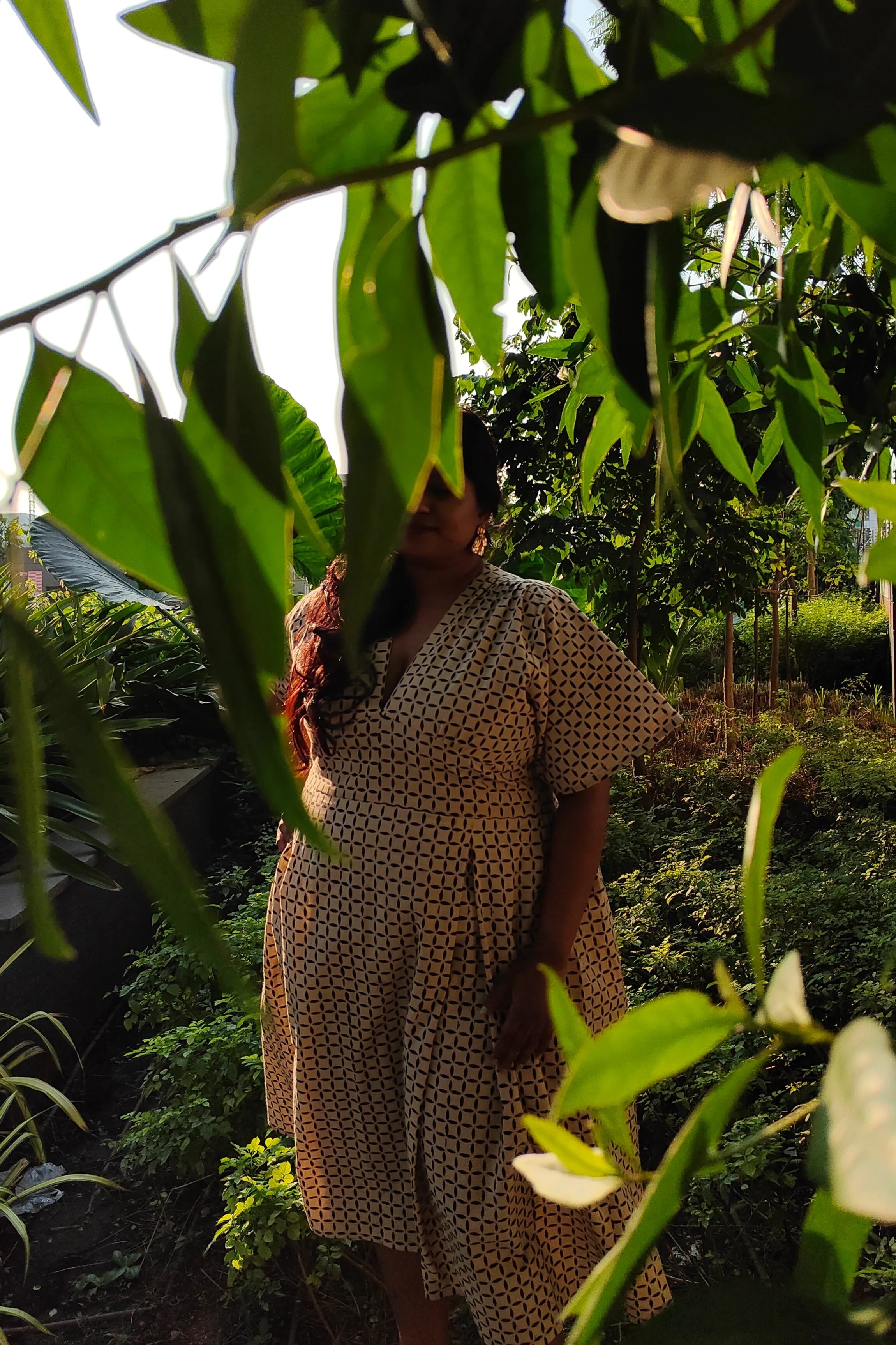 Ilamra hand block printed Kalamkari art organic cotton naturally dyed retro bell sleeves, cinched waistline, symmetrical geometric print breezy dress