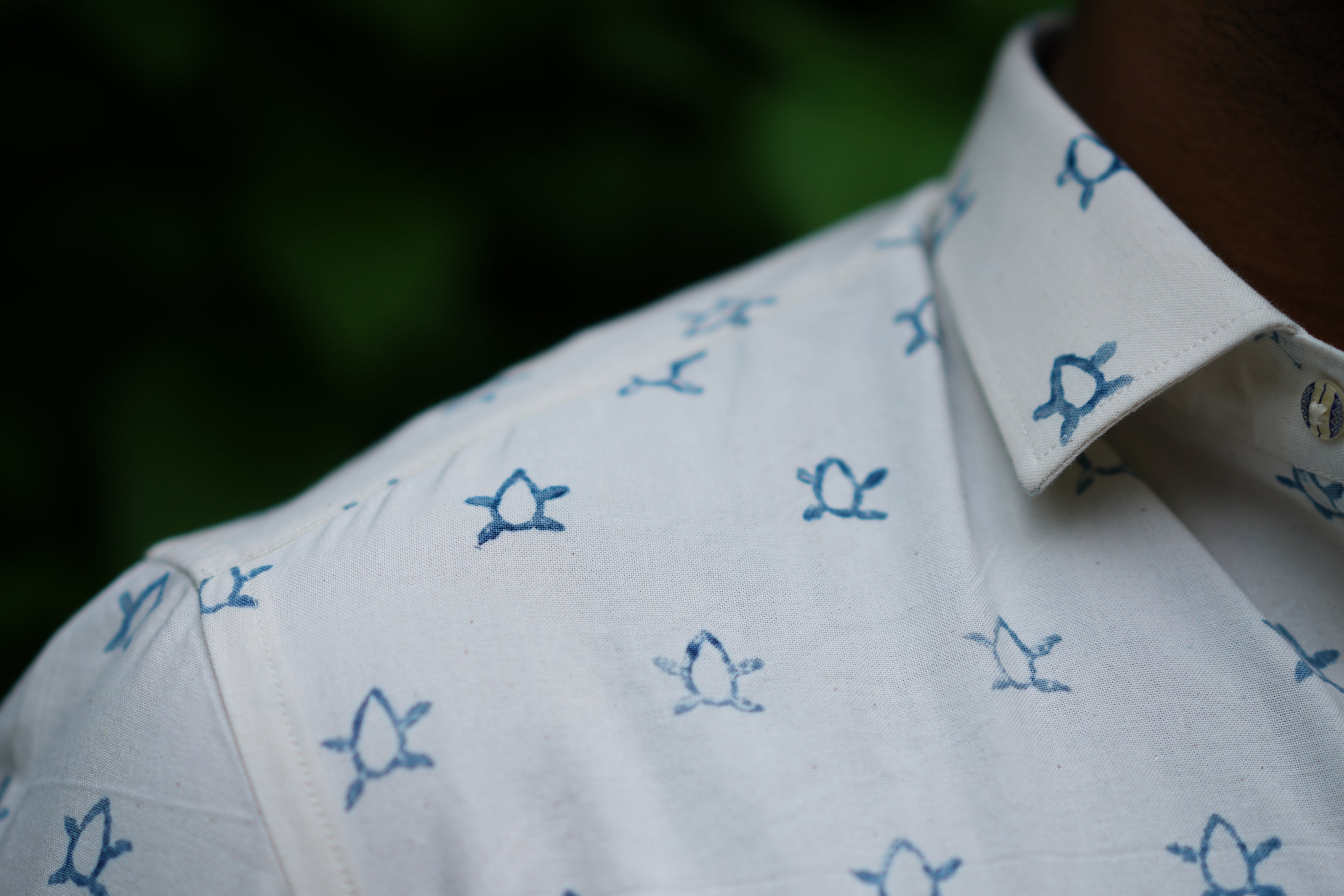 Men's Cotton Kurta featuring indigo turtle print on one side and Indigo floral print on the other.