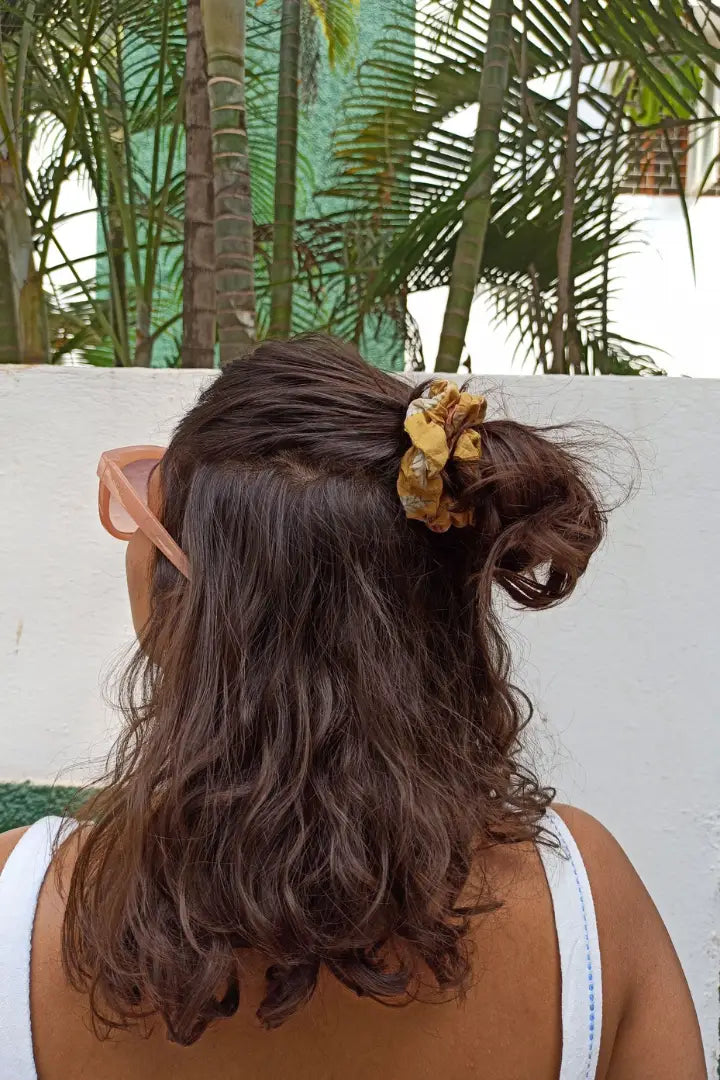ilamra hand block printed naturally dyed organic cotton Mustard yellow, hints of dirty green and red upcycled cotton scrunchie