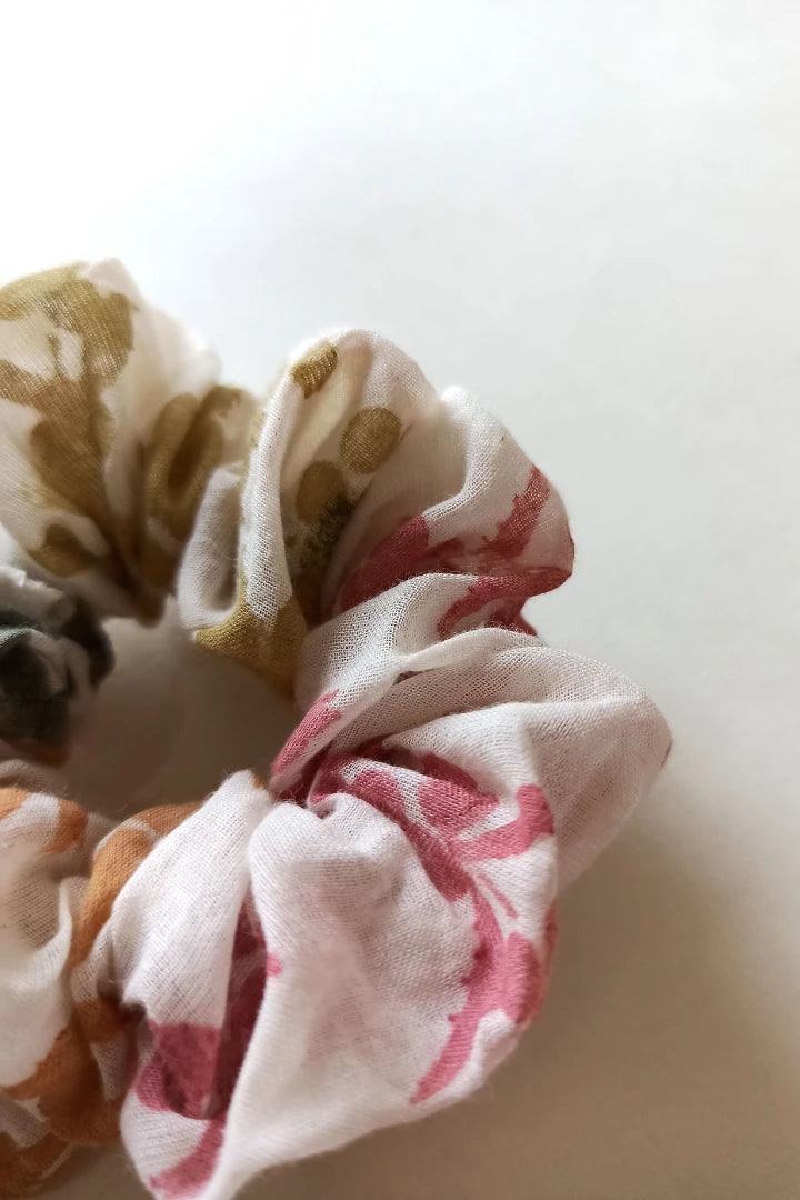 ilamra hand block printed naturally dyed organic cotton Off-white, hints of orange, blush pink, light green and dirty green upcycled cotton beautiful scrunchie