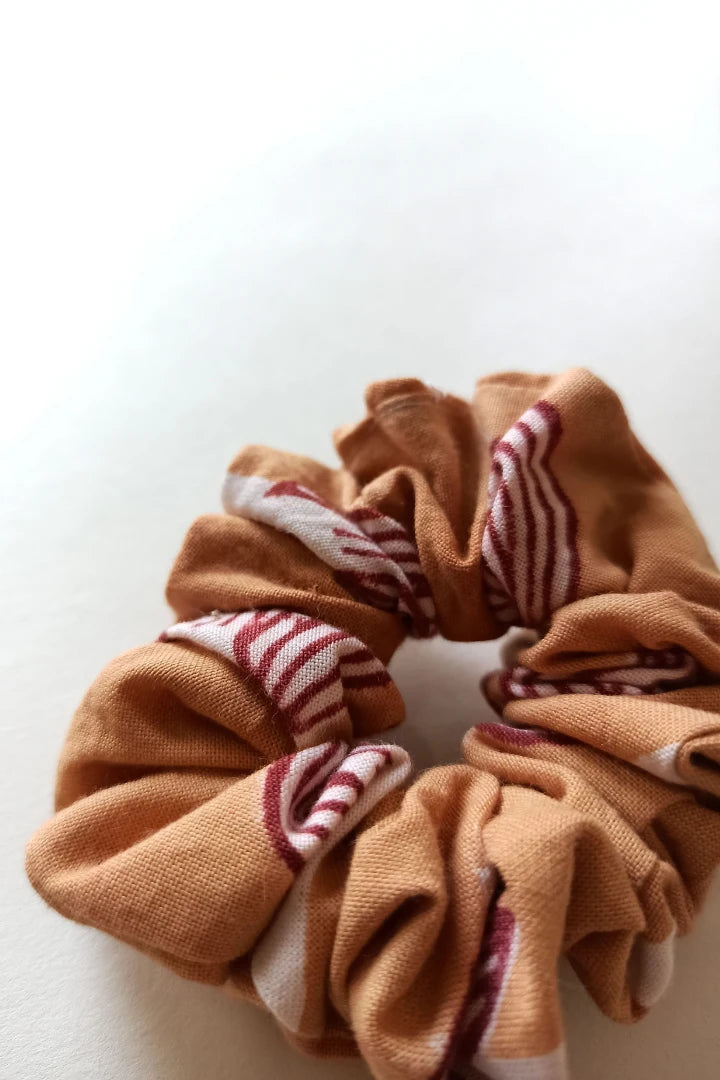 ilamra hand block printed naturally dyed organic cotton Orange and hints of madder red upcycled cotton sexy scrunchie