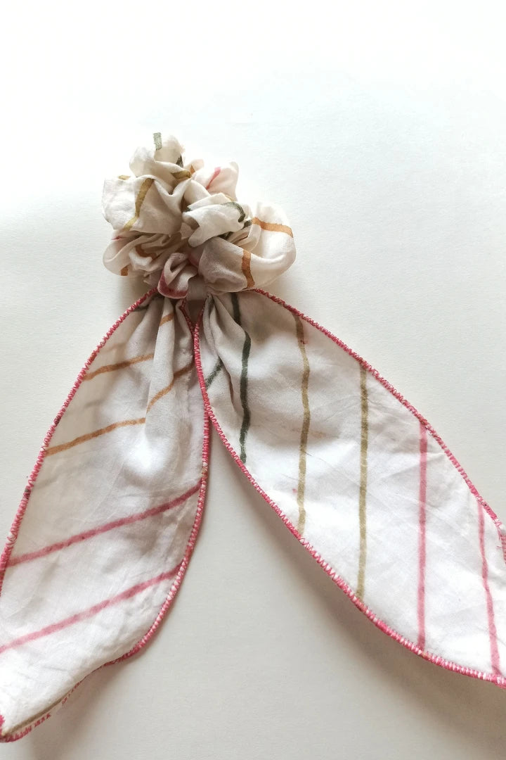 ilamra hand block printed naturally dyed organic cotton Off-white, hints of orange, blush pink, light green and dirty green upcycled cotton fun scrunchie